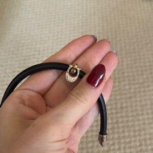 Elegant Black Bracelet with Gold and Rhinestone Clasp